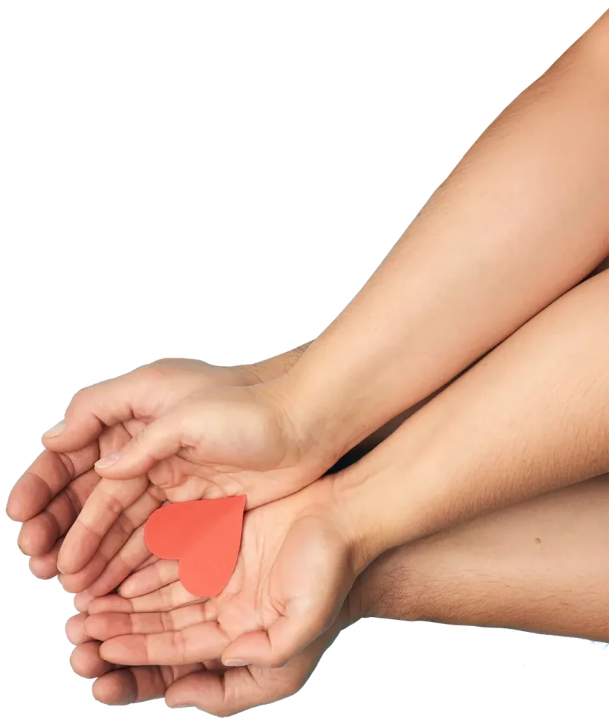 two-female-hands-lie-male-palms-hold-red-paper-heart